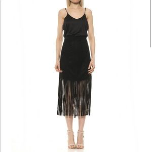 Faux suede asymmetric skirt with long tassels